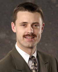 Curtis E. Jacob